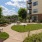 The outdoor lounge at Victor Stonebridge Apartments in Woodbridge, VA, featuring grill stations and outdoor furniture.