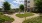 a courtyard with benches and trees